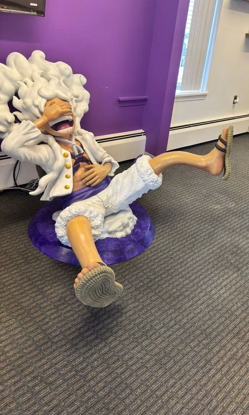 Life-size Gear 5 Luffy greeter inside Thousand Sunny Cards